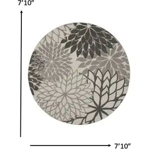 Photo of Round Silver and Gray Indoor Outdoor Area Rug