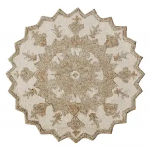 Photo of Round Tan Retro Modern Medallion Area Rug