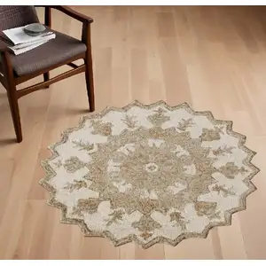 Photo of Round Tan Retro Modern Medallion Area Rug