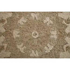 Photo of Round Tan Retro Modern Medallion Area Rug