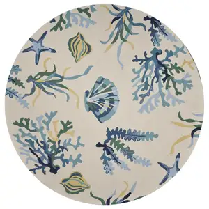 Photo of Round UV treated Polypropylene Ivory or Blue Area Rug