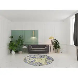 Photo of Round Wool Blue or  Green Area Rug