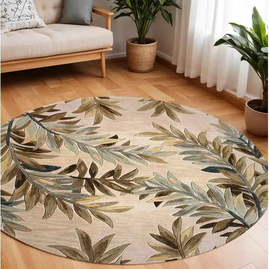 7' Ivory Brown And Blue Wool Botanical Leaves Hand Tufted Round Rug Photo 1