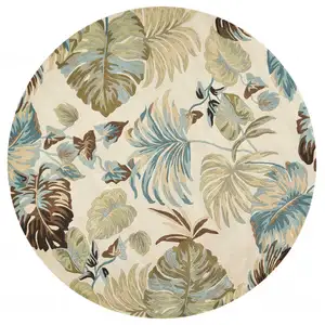 Photo of Round Wool Ivory or Blue Area Rug