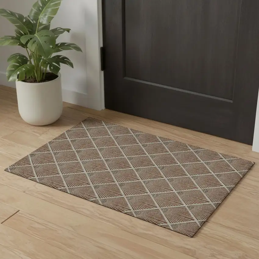 Rust And Beige Abstract Geometric Washable Area Rug With UV Protection Photo 1