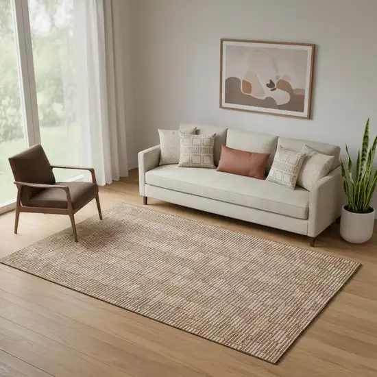 Rust And Beige Abstract Geometric Washable Area Rug With UV Protection Photo 1