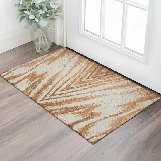 Rust And Beige Abstract Washable Area Rug With UV Protection Photo 1