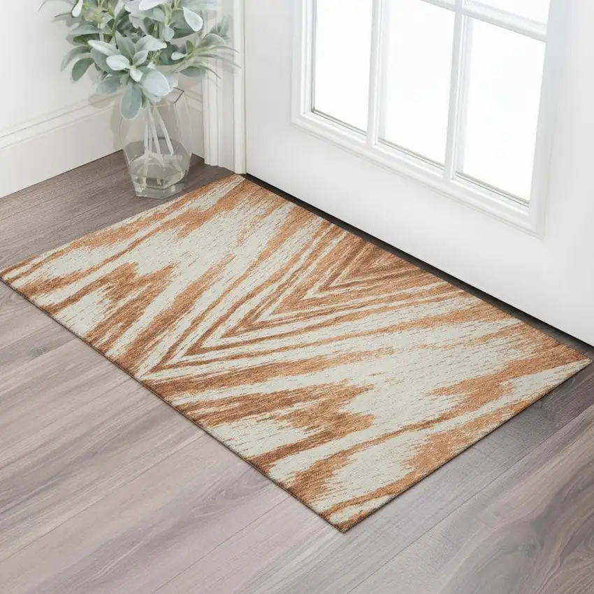 Rust And Beige Abstract Washable Area Rug With UV Protection Photo 1
