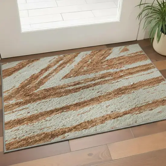 Rust And Beige Abstract Washable Area Rug With UV Protection Photo 2