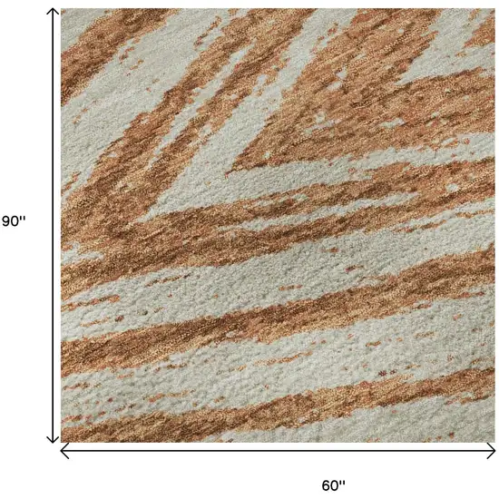 Rust And Beige Abstract Washable Area Rug With UV Protection Photo 9