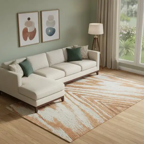 Rust And Beige Abstract Washable Area Rug With UV Protection Photo 1