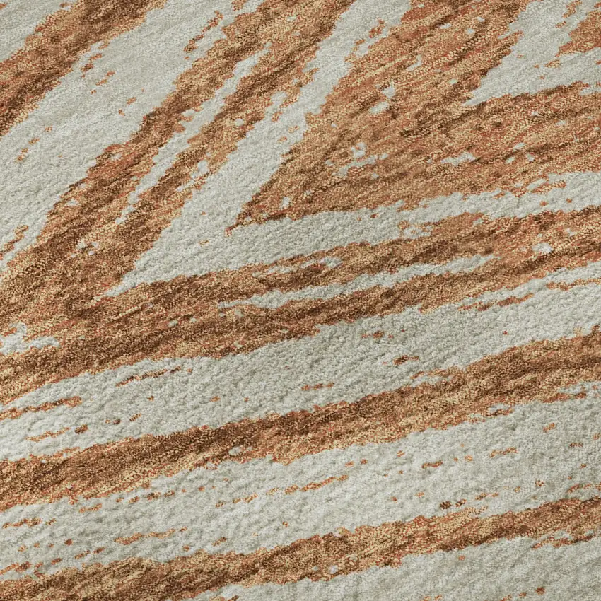 Rust And Beige Abstract Washable Area Rug With UV Protection Photo 1