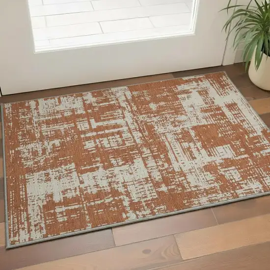 Rust And Beige Abstract Washable Area Rug With UV Protection Photo 2