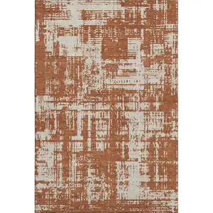 Photo of Rust And Beige Abstract Washable Area Rug With UV Protection