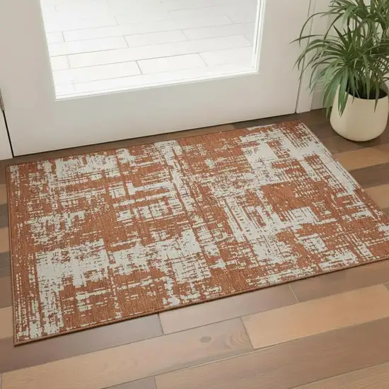 Rust And Beige Abstract Washable Area Rug With UV Protection Photo 1