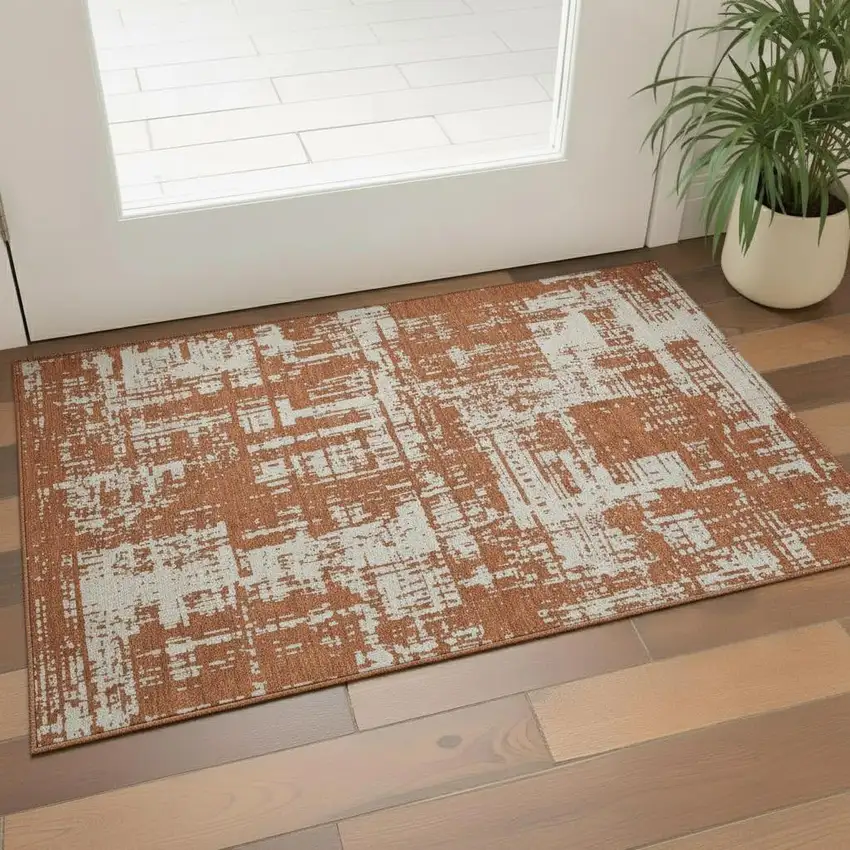 Rust And Beige Abstract Washable Area Rug With UV Protection Photo 1