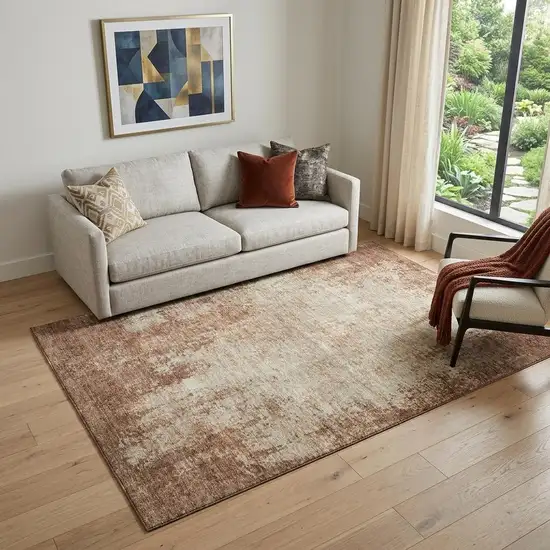 Rust And Beige Abstract Washable Area Rug With UV Protection Photo 1