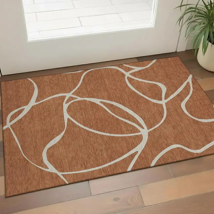 Rust And Beige Abstract Washable Area Rug With UV Protection Photo 2