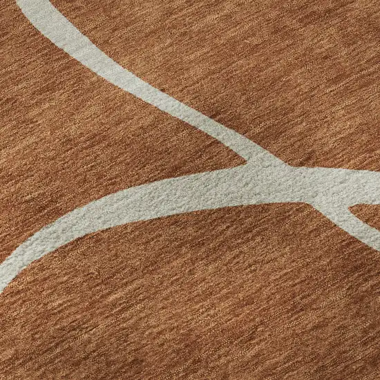 Rust And Beige Abstract Washable Area Rug With UV Protection Photo 9