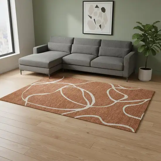 Rust And Beige Abstract Washable Area Rug With UV Protection Photo 2
