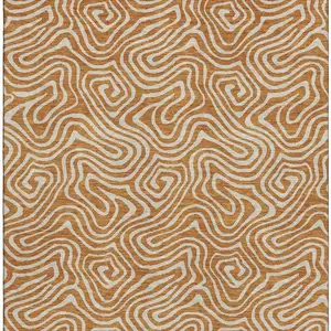 Photo of Rust And Beige Abstract Washable Area Rug With UV Protection