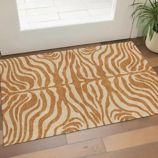 Rust And Beige Animal Print Washable Area Rug With UV Protection Photo 1