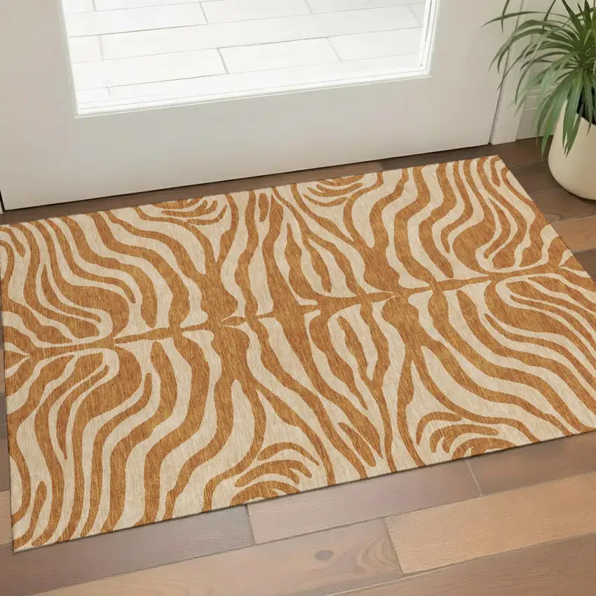 Rust And Beige Animal Print Washable Area Rug With UV Protection Photo 1