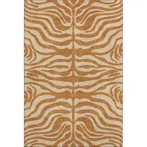 Photo of Rust And Beige Animal Print Washable Area Rug With UV Protection