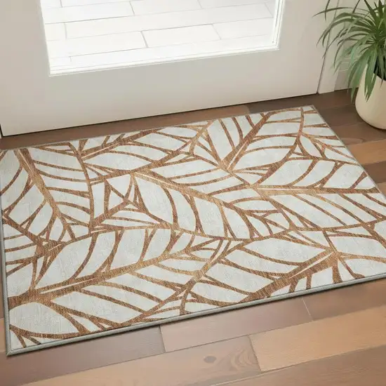 Rust And Beige Floral Washable Area Rug With UV Protection Photo 2