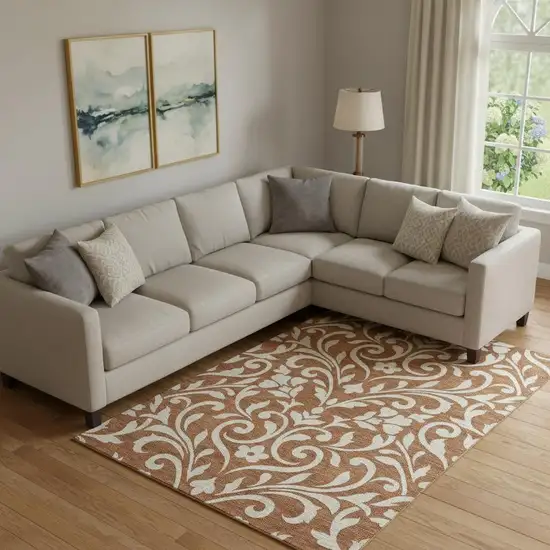 Rust And Beige Floral Washable Area Rug With UV Protection Photo 1