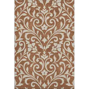 Photo of Rust And Beige Floral Washable Area Rug With UV Protection