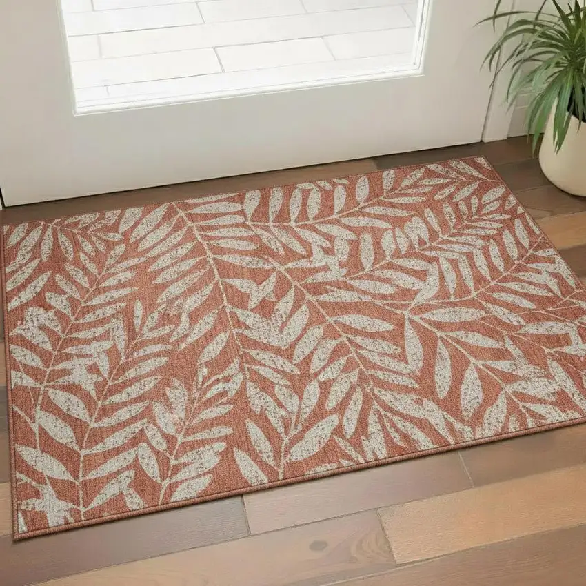 Rust And Beige Floral Washable Area Rug With UV Protection Photo 1