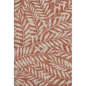 Photo of Rust And Beige Floral Washable Area Rug With UV Protection