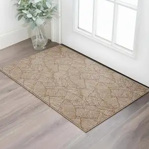 Photo of Rust And Beige Floral Washable Area Rug With UV Protection