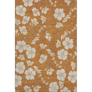 Photo of Rust And Beige Floral Washable Area Rug With UV Protection