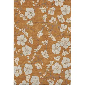 Photo of Rust And Beige Floral Washable Area Rug With UV Protection