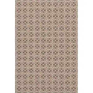 Photo of Rust And Beige Geometric Washable Area Rug With UV Protection