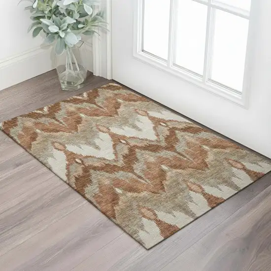 Rust And Beige Ikat Washable Area Rug With UV Protection Photo 1