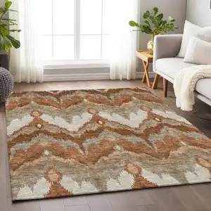Photo of Rust And Beige Ikat Washable Area Rug With UV Protection