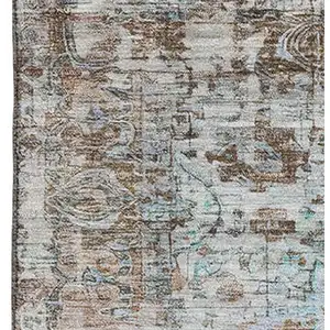 Photo of Rust And Beige Oriental Washable Area Rug With UV Protection