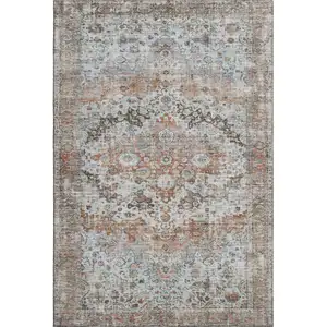 Photo of Rust And Beige Oriental Washable Area Rug With UV Protection