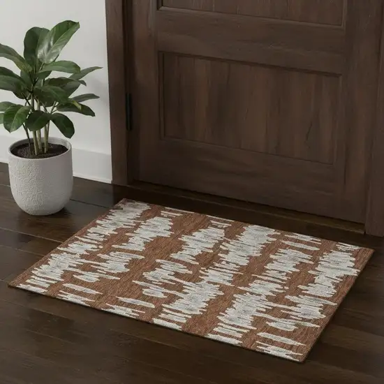 Rust And Beige Striped Washable Area Rug With UV Protection Photo 1