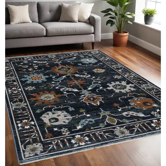 Rust And Black Oriental Area Rug With Fringe Photo 1