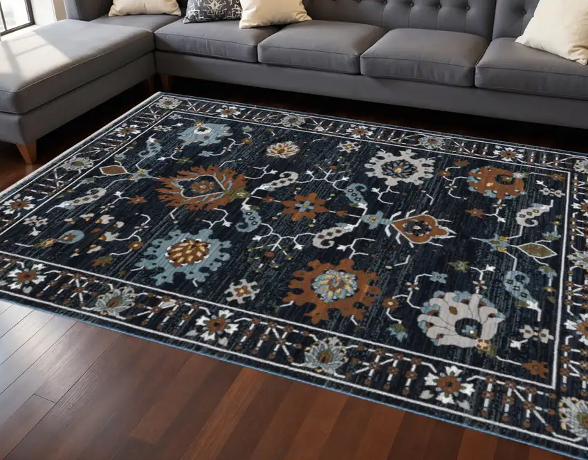 Rust And Black Oriental Area Rug With Fringe Photo 1