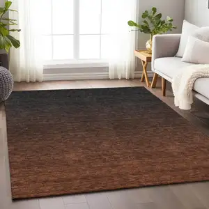 Photo of Rust And Charcoal Ombre Washable Area Rug With UV Protection