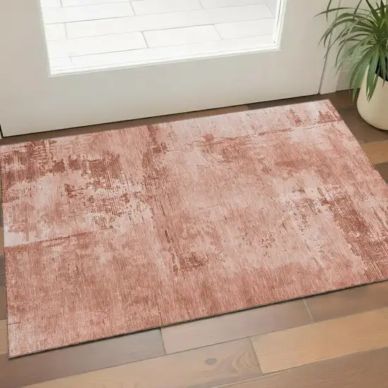 Rust And Coral Abstract Washable Area Rug With UV Protection Photo 1