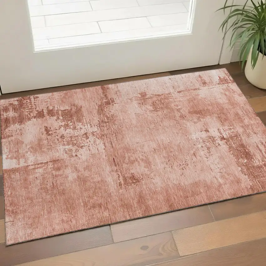 Rust And Coral Abstract Washable Area Rug With UV Protection Photo 1