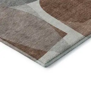 Photo of Rust And Gray Abstract Washable Area Rug With UV Protection
