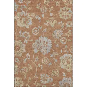 Photo of Rust And Gray Floral Washable Area Rug With UV Protection