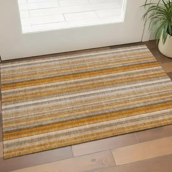 Rust And Gray Striped Washable Area Rug With UV Protection Photo 1